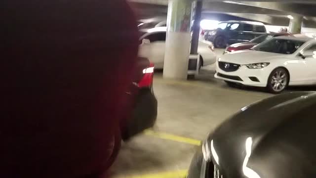 Man scares other man in red shirt