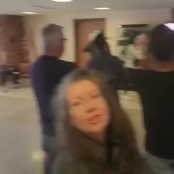 A woman was arrested in Pennsylvania for encouraging people to stay in line and vote early