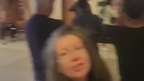 A woman was arrested in Pennsylvania for encouraging people to stay in line and vote early