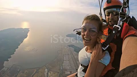 woman-excited-in-her-first-skydive-in-a-tandem