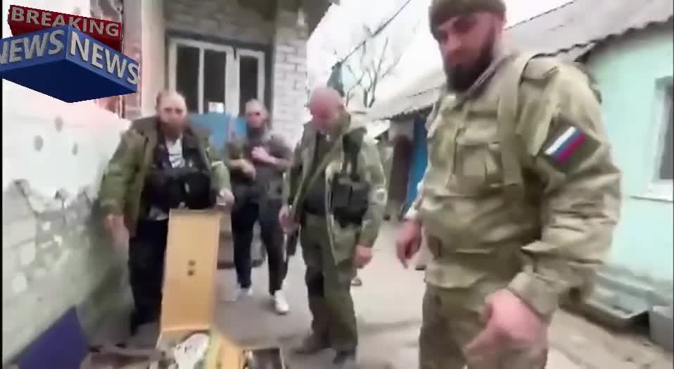 Soldiers of units from Chechnya demonstrate trophies