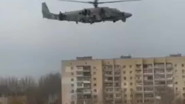 Russian KA-52 attack helicopter flying through Armiansk, Crimea