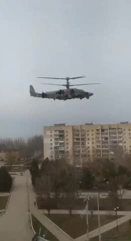 Russian KA-52 attack helicopter flying through Armiansk, Crimea