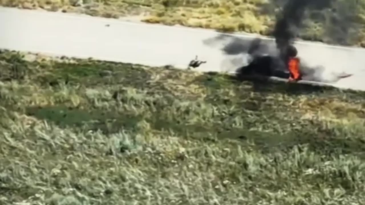 Russian Soldier on a Dirt Bike Going Out in a Blaze of... Something