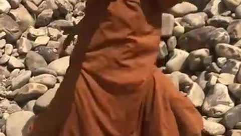 Monk breaks rock with fingers