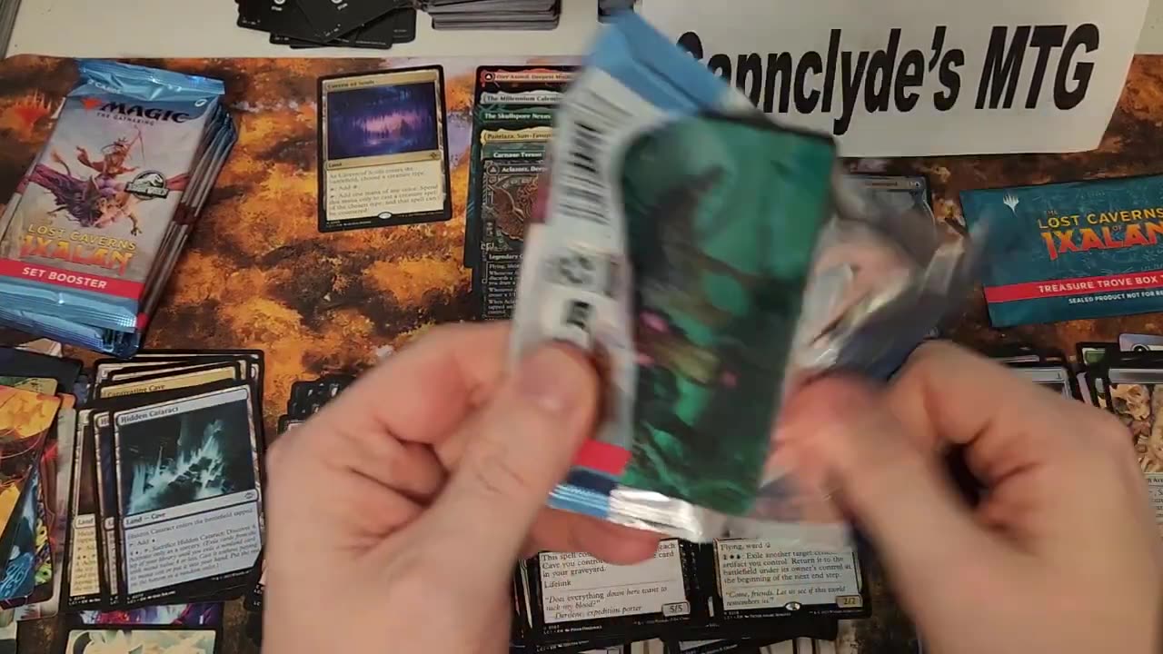 Are Cavern of souls in ixalan or is this a scam? 11 boxes to find 1?