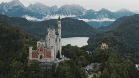 Drone footage of a castle on a mountain