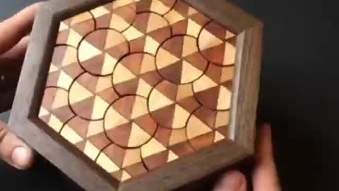 Disc Box. It takes 150 rotations to match up the triangles and open it.
