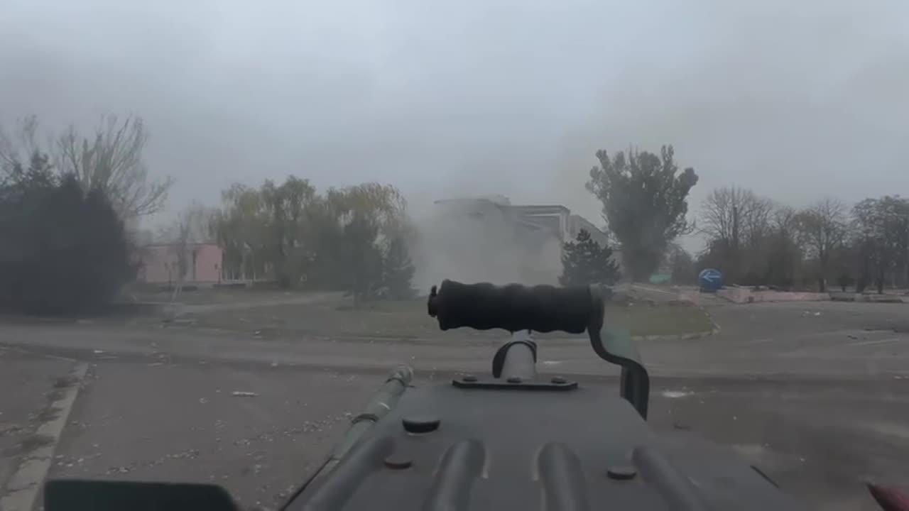Heavy Machine Gun On Top of a Tank Lighting Up Russian Positions