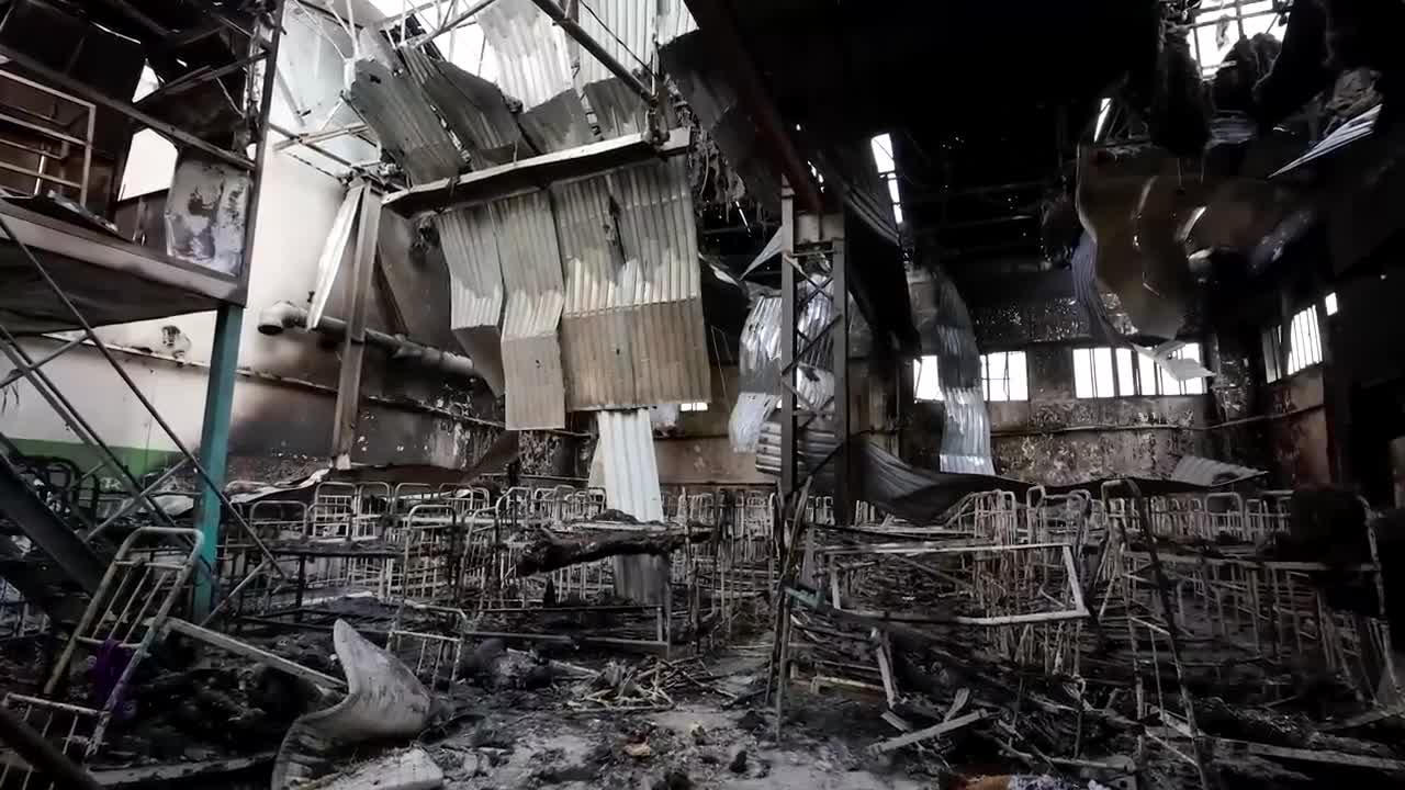 WARNING: GRAPHIC CONTENT - Russia, Ukraine trade blame after dozens killed in prison blast