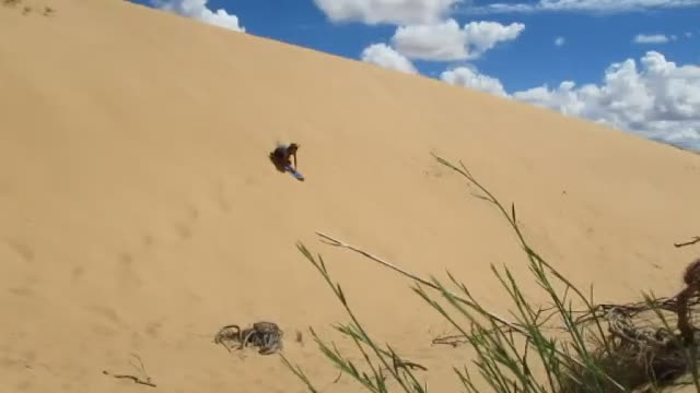 Dune Surfing at Witsand Nature reserve in South Africa