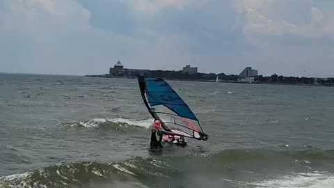 "Battling the Wind: Windsurfing Adventure in Brooklyn"