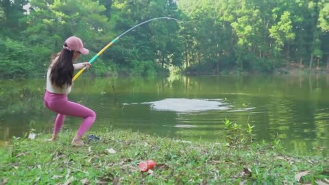 A Beautiful Girl Catching Fish