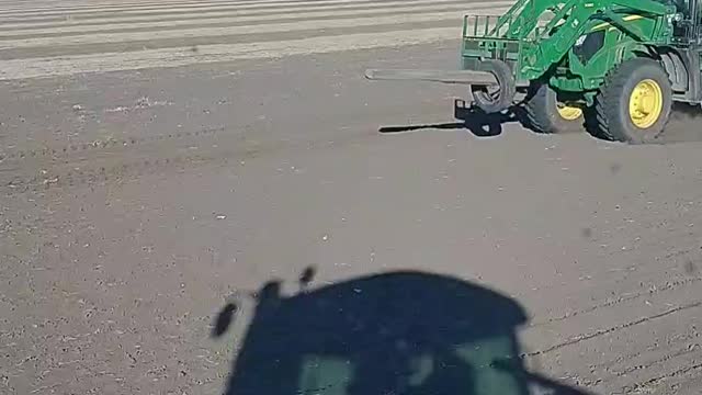 Laying Out drain tile with stringer cart