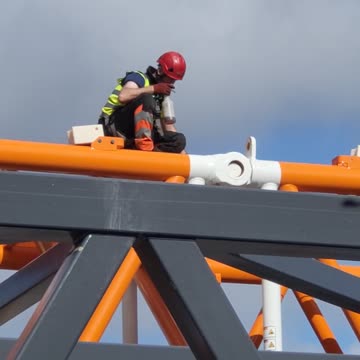 Powerful Mobile lattice boom Crane being assembled Scotland