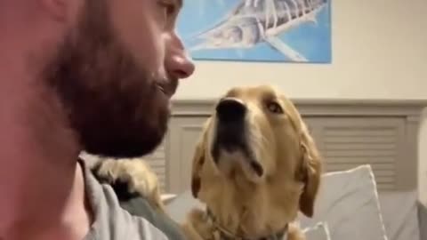 Kissing his dog on the head and seeing his reaction 😭