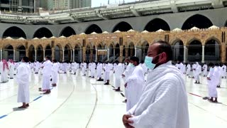 Pilgrims hold socially distanced Ramadan prayers in Mecca