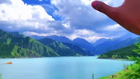 Look at this green water and green mountains