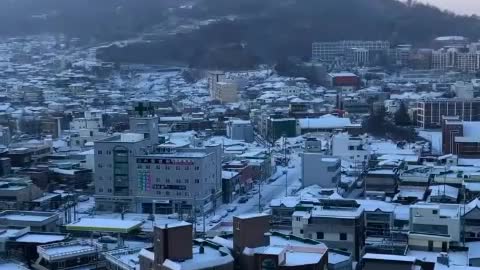 Snowy town from the apartment