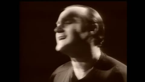 Phil Collins - Another Day In Paradise (Official Music Video)