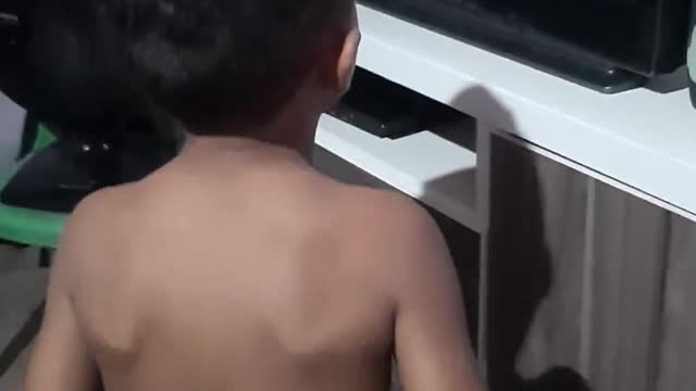 Look at the despair of this child playing video games