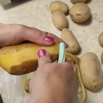 Peeling potatoes for stew