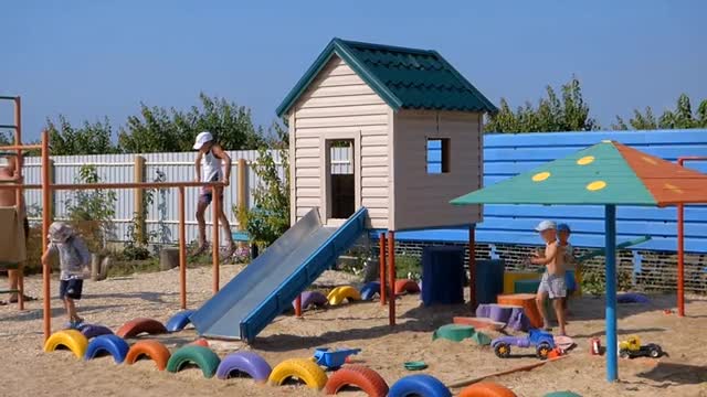 Young children play wonderful games in the park