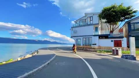 Beautiful Scenery-Sea,House, road and cloud