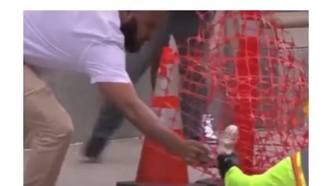 This man got stuck in cement and people are trying to get it out