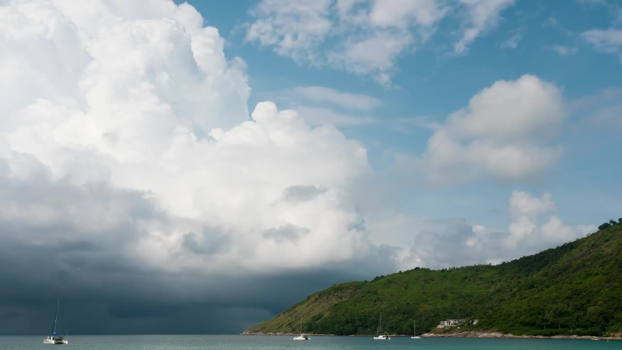 Clouds arriving at the beach