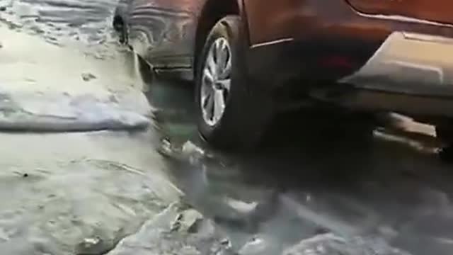 Frozen Cars on a road in Shenyang, China.