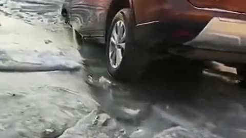 Frozen Cars on a road in Shenyang, China.