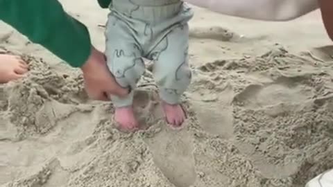 Funny Cute Baby in Sea Side