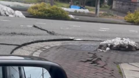 Effect of the earthquake that hit Central Japan today roads cracking and pavements rising.