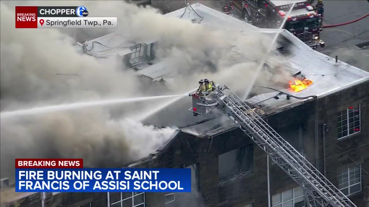 Firefighters battling fire at St. Francis of Assisi School in Springfield Township, Delaware County