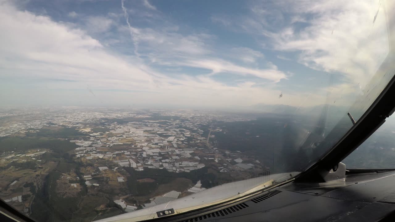 Window view landing on Antalya's runway 18C Full