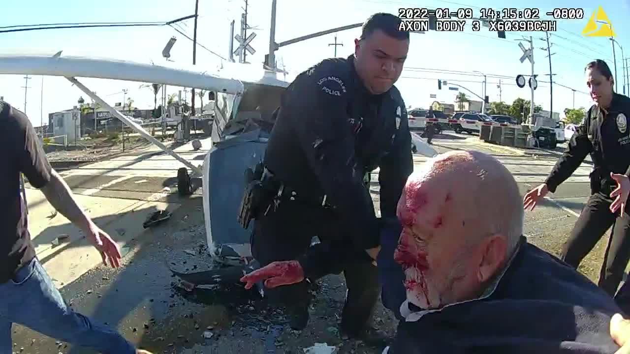 WATCH: Police Pull Man From Small Plane Crash Seconds Before It's Hit By Train