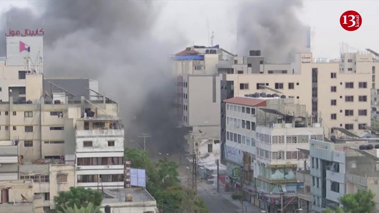 Watch as Gaza's National Bank building explodes after Israeli air strike