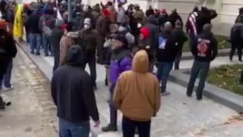 Trump supporter pleading with police to call for backup during the Capitol break-in