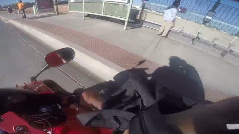 Biker Stops To Give Ride To A Man Trying To Catch The Bus