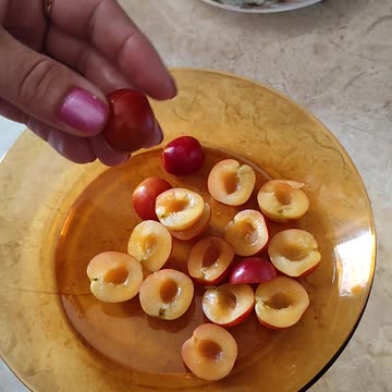 Pitting plums for pie