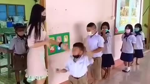 Students greet their teacher every morning