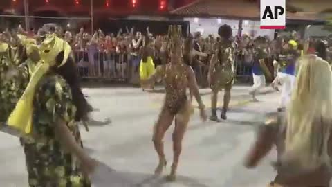 Samba schools parade through Rio de Janeiro