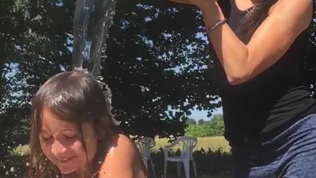 Bucket challenge - 9 years girls gets wet