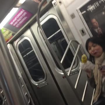 Girl glasses eating corn on the cob