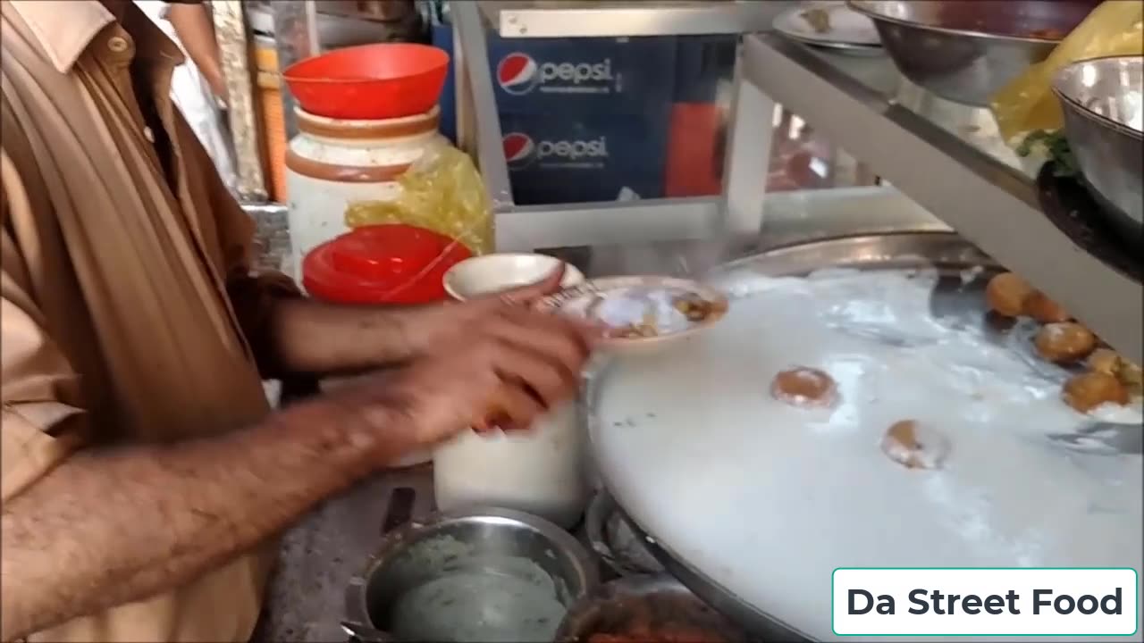 Hardworking man selling Chana Chaat at Street Food