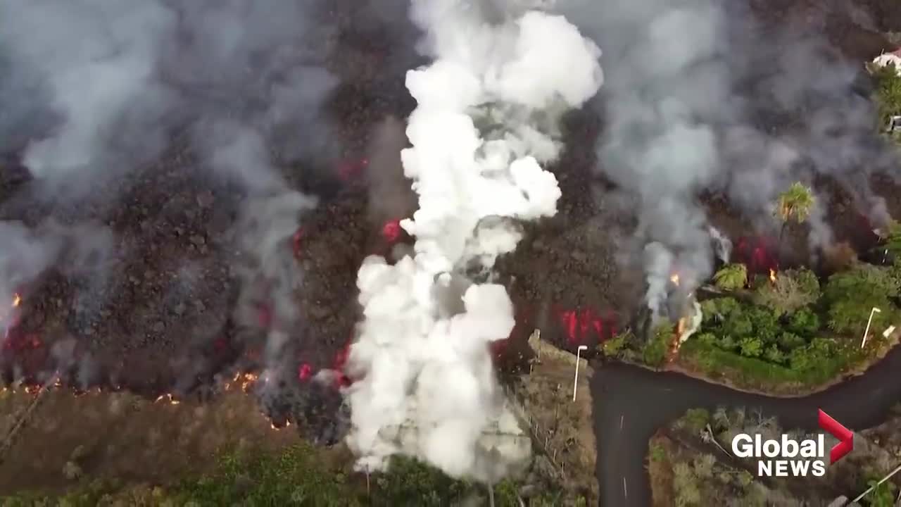 La Palma volcano: Drone video shows black lava swallowing pool, homes on its way to coast