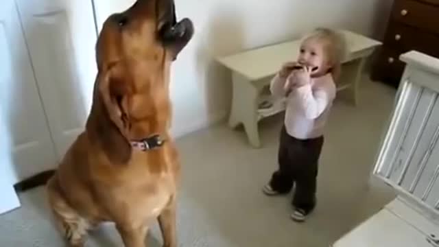 A child makes music with his dog