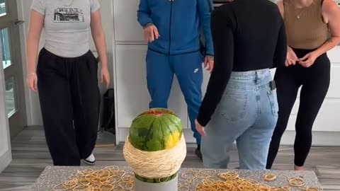 1000 RUBBER BANDS VS WATERMELON!!