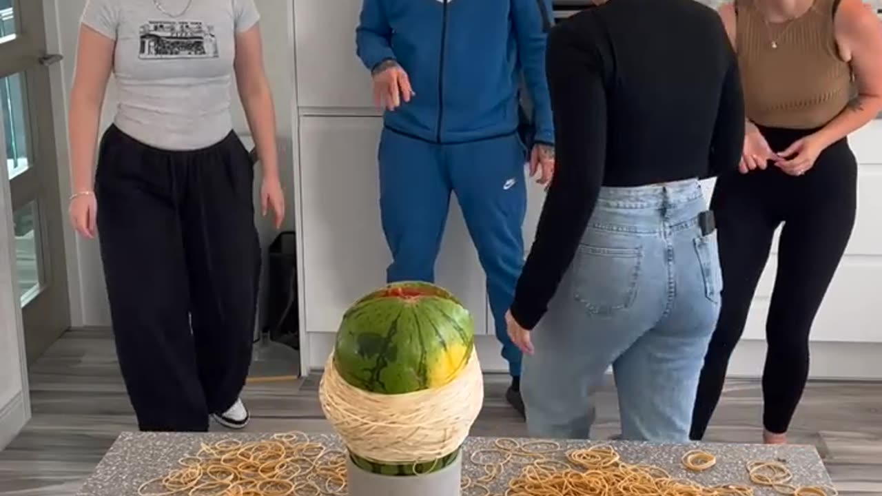 1000 RUBBER BANDS VS WATERMELON!!